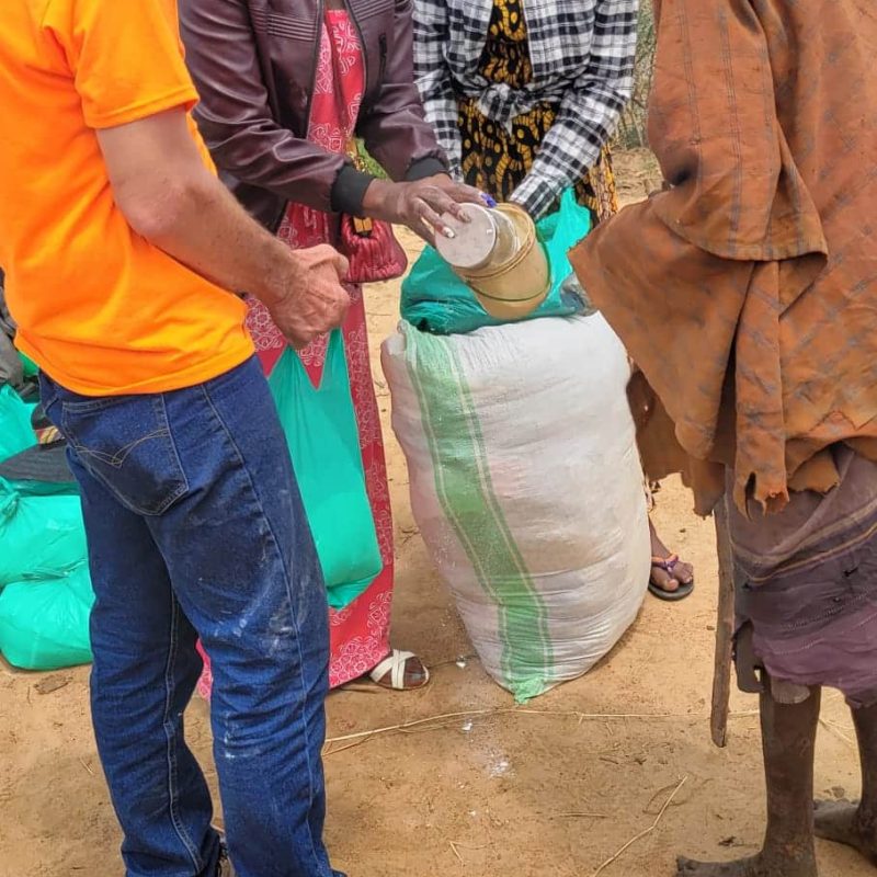 Relief workers distributing aid to families
